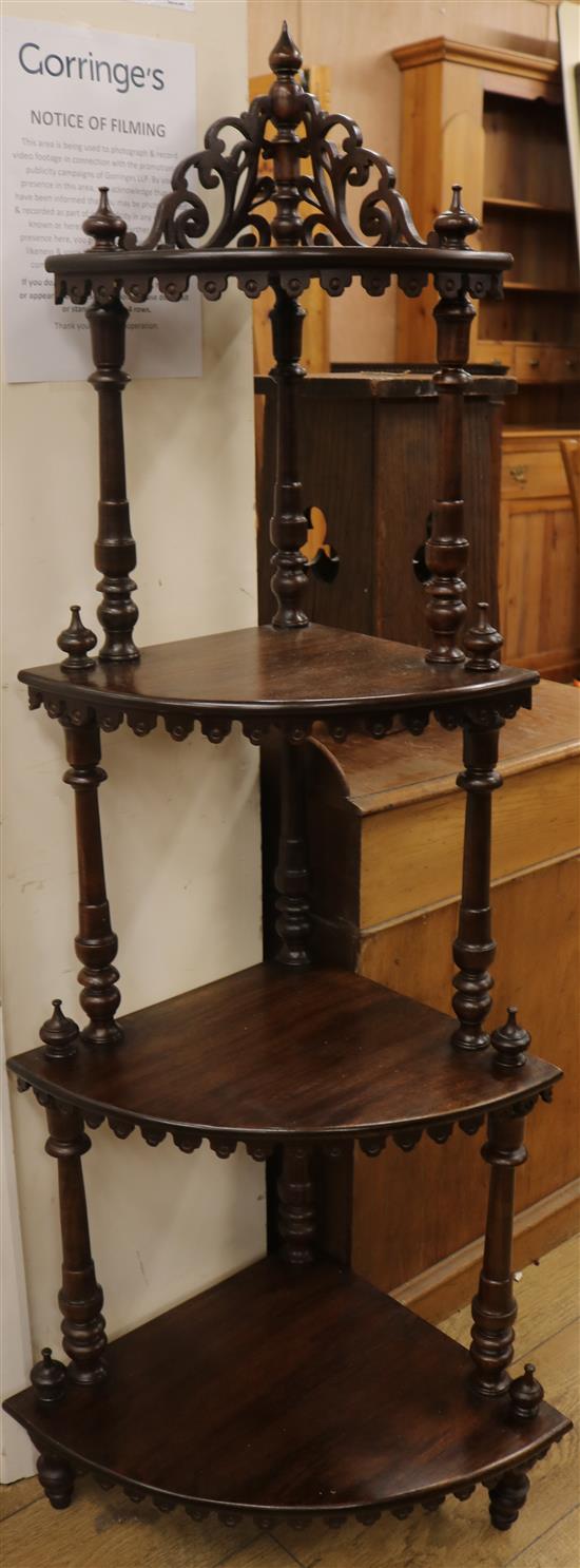 A four tier mahogany corner whatnot, W.59cm